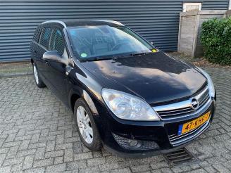 damaged passenger cars Opel Astra Astra H SW (L35), Combi, 2004 / 2014 1.6 16V Twinport 2009/11