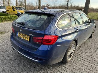 BMW 3-serie 320i Automaat Stationcar Luxury Edition picture 4