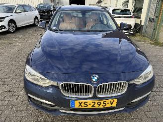 BMW 3-serie 320i Automaat Stationcar Luxury Edition picture 2