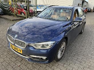 uszkodzony samochody osobowe BMW 3-serie 320i Automaat Stationcar Luxury Edition 2019/3